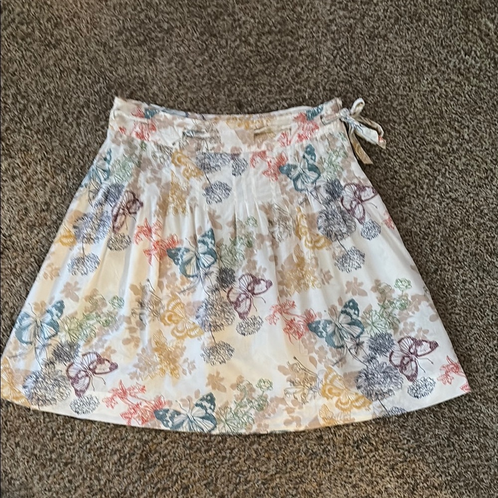 Multi colored skirt with floral and butterfly design size 10